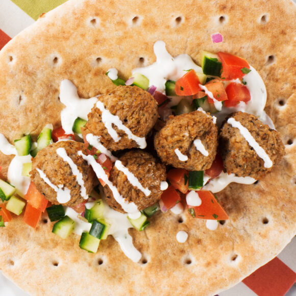 Meatballs In Pita With Cucumbers, Tomatoes And Tzatziki Sauce